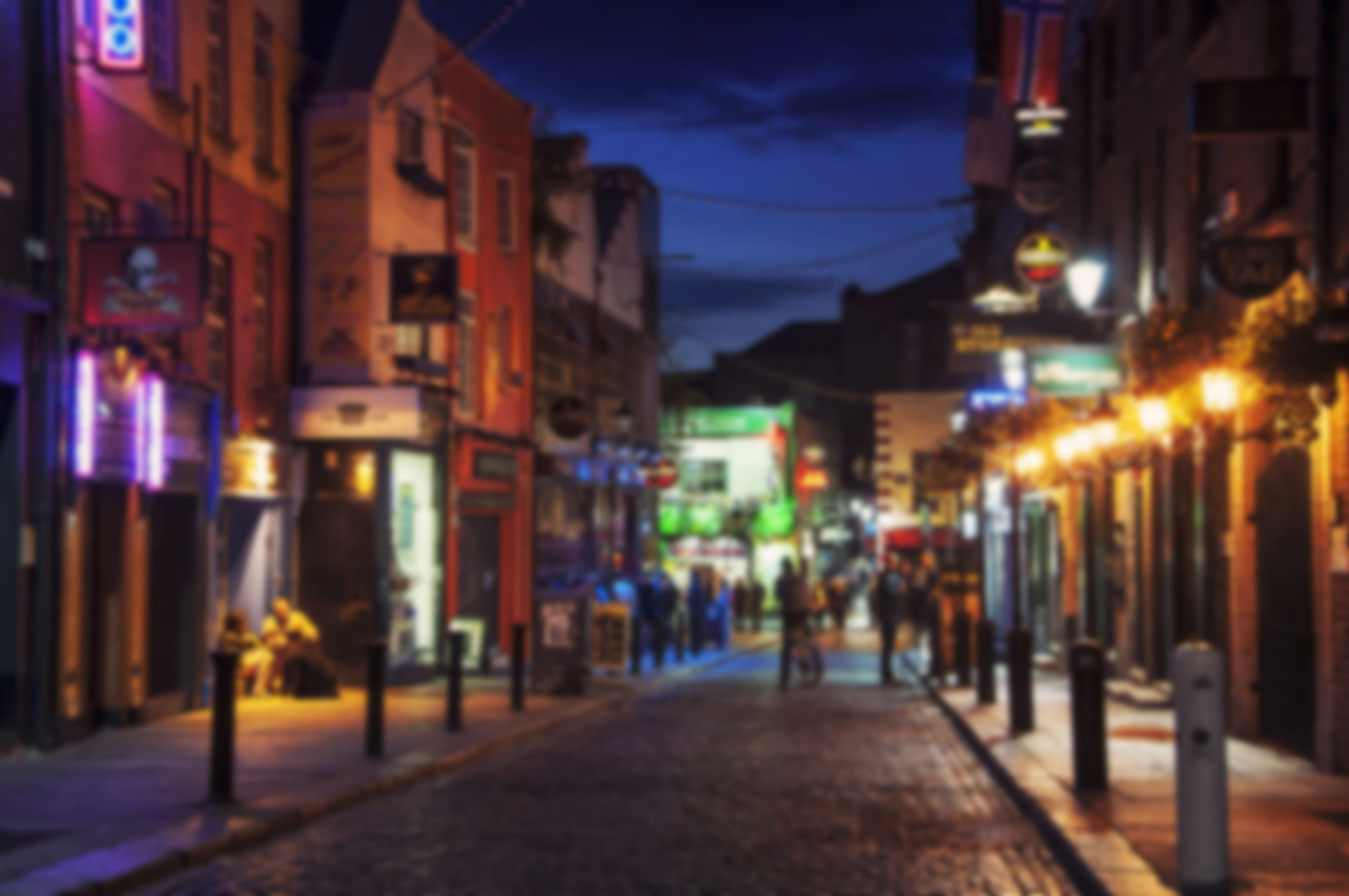 50770357 - blurred travel backgrounds - nightlife at popular historical part of dublin, ireland - temple bar quarter. the area is the location of many bars, pubs and restaurants